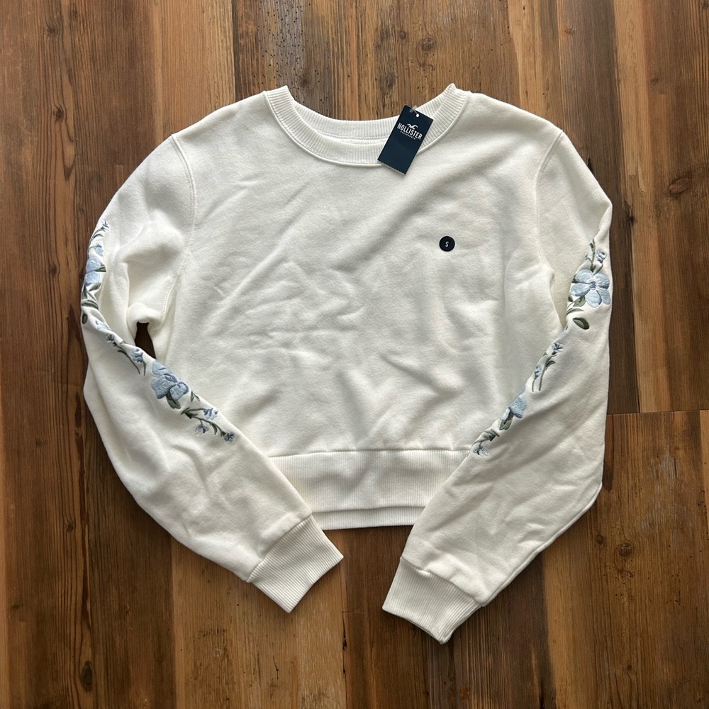 White Hollister Top with Floral Sleeves